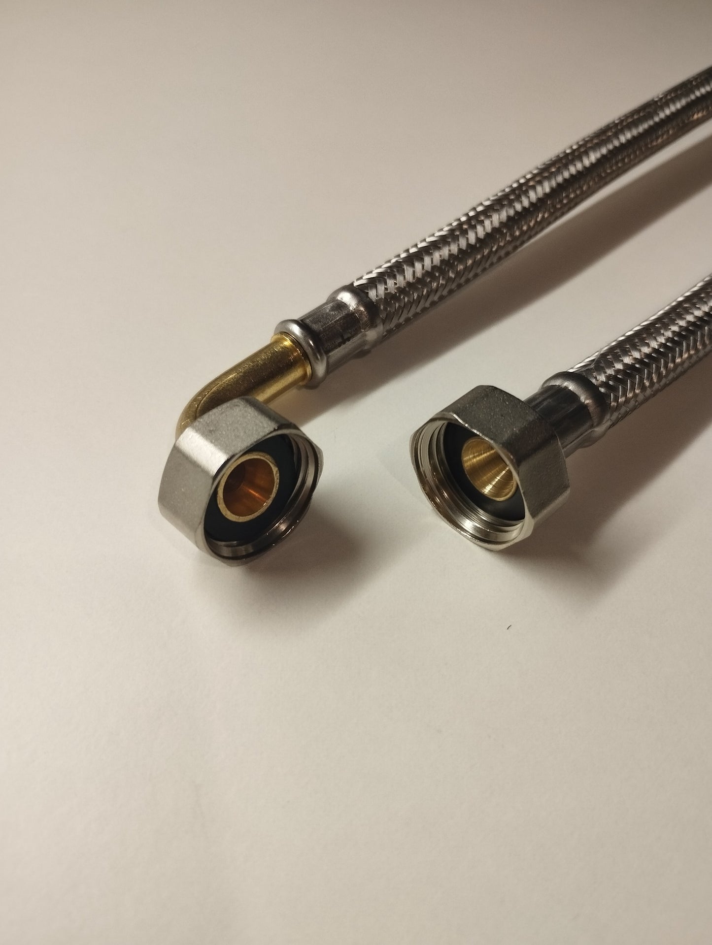 Flexschlauch DN8 1/2" IG (mit Dichtung) x 1/2" IG 90° Bogen mit Edelstahlumflechtung